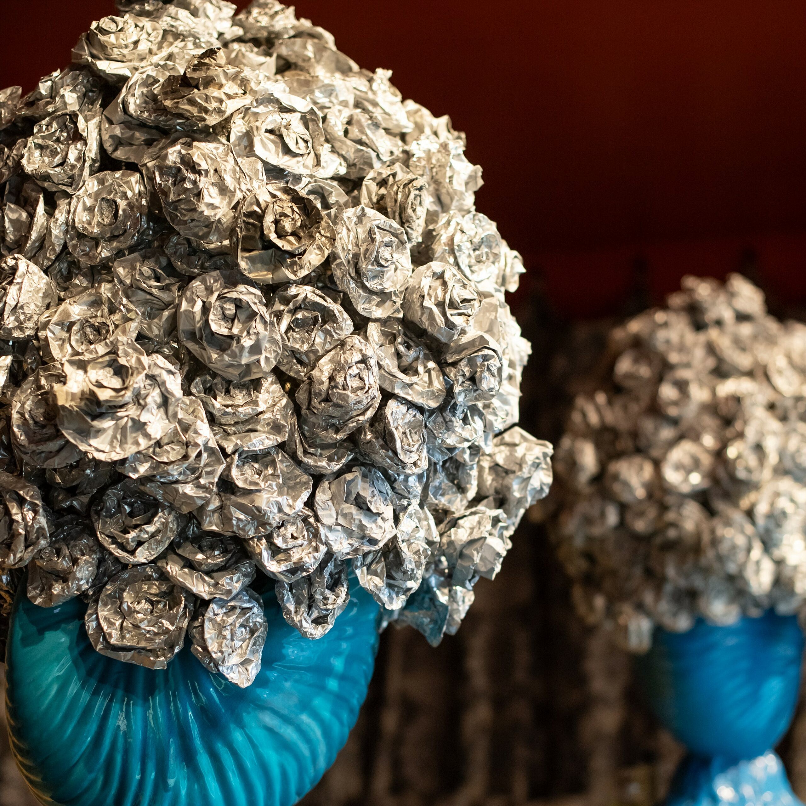 Detail of aluminium foil flowers in the Zoffany Entrance Hall at WOW!house 2024